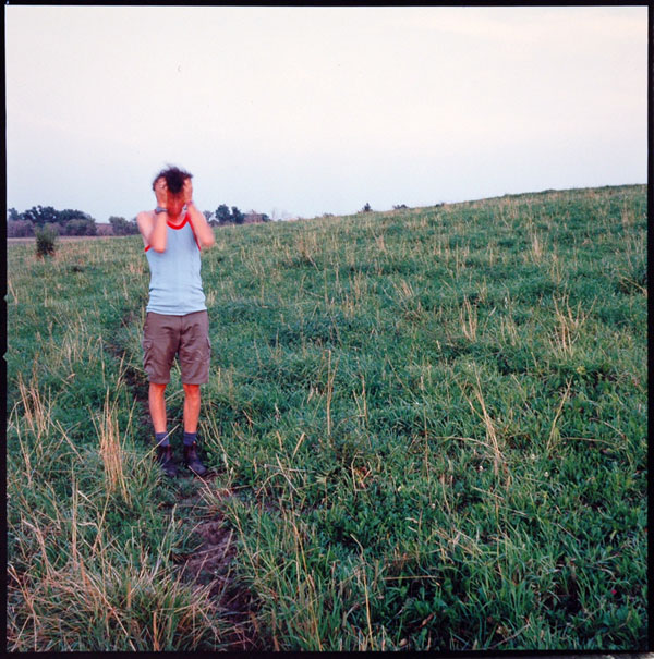 Self-portrait, pasture, Neponset, Il, July 2003