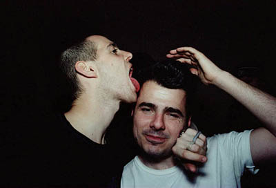 Isaac Green being licked by Mike Skinner (The Streets)